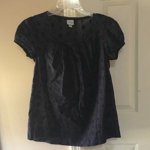 Navy blue top with polka dots